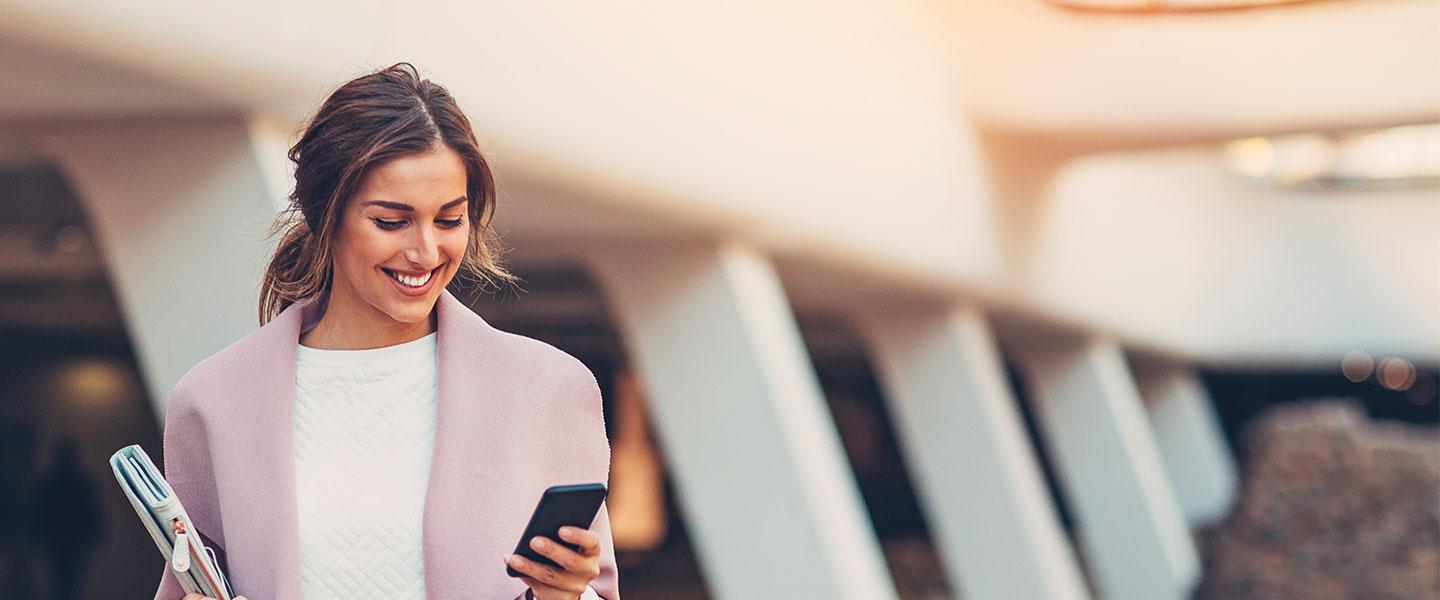 a woman holding a tablet